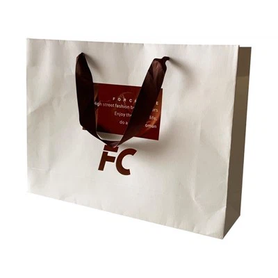 ¿Cuál es la resistencia al calor de los bolsos de papel revestido?